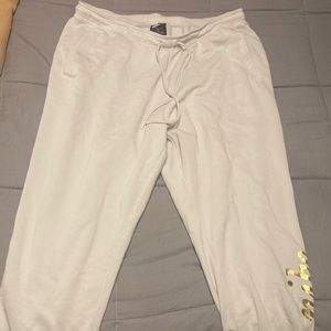 Nike 2X grey jogger style athletic pants.